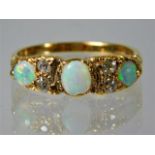 A 15ct gold antique ring set with diamond and opal 3.4g size L