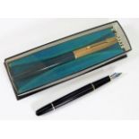 Boxed Parker Pen with gold plated lid twinned with a MontBlanc pen no lid