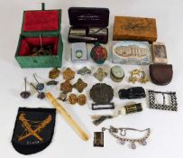 Collection of badges, a snuff bottle box cards, razor kit, cigarette holder & other sundry items