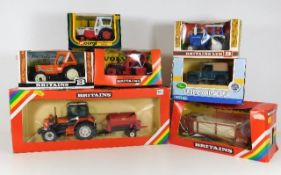 Seven boxed agricultural vehicles including Corgi & Britains