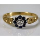 A 9ct gold ring set with diamond & sapphire 1.8g s