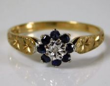 A 9ct gold ring set with diamond & sapphire 1.8g s