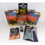 A collection of Star Trek toys including a car air freshener