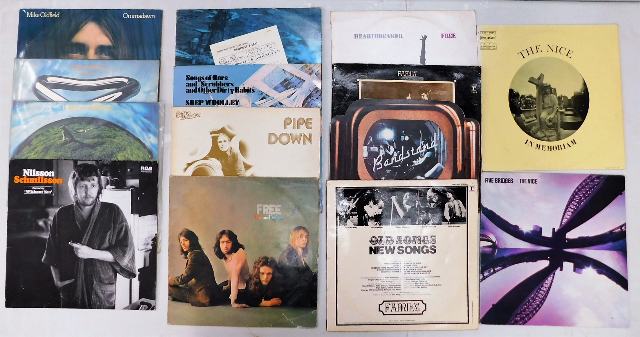 Fourteen vinyl LP's including Nilsson, Shep Woolle