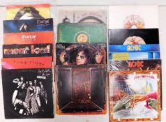 Fourteen vinyl LP's including Alice Cooper, AC/DC,