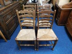 Four rush seated ladderback chairs
