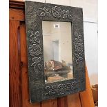 A decorative Pewter mirror