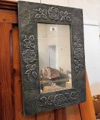 A decorative Pewter mirror