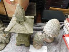 Three pieces of garden ornaments in recon stone