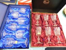 Two boxes of cut glass wine glasses