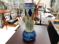 A Daulton stoneware vase approx 10"