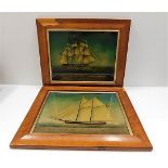 A pair of maritime reverse painted style glass pictures in maple veneered frames titled West Indiama