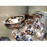 A set of three Masons Ironstone graduated jugs in the Mandalay pattern, two Doulton cabinet plates,
