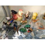 A quantity of tinplate clockwork toy items