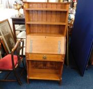 An early 20th Century art nouveau oak bureau bookc