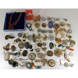 A quantity of costume jewellery, mainly brooches