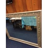 A silver coloured Morris mirror approx 48" x 44"