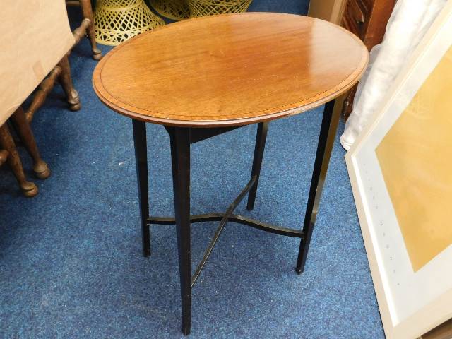 An oval occasional table