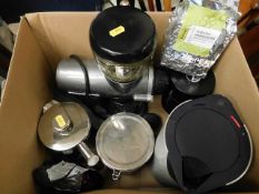 A coffee grinder, coffee beans and other related i