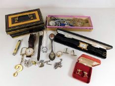 A quantity of miscellany items including a tin