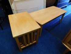 A nest of three tables twinned with a coffee table