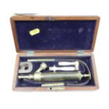 An early 20th Century boxed bladder syringe