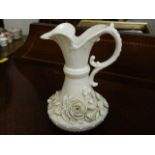 A decorative Belleek jug with black base stamp in