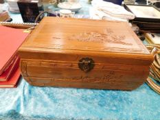 Oriental jewellery box with carved decor