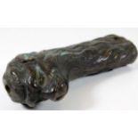 A bronze Anglo-Indian sword handle 5.25in long