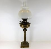 A c.1910 Duplex brass oil lamp with corinthian col