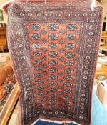 A Persian Bokhara rug approx 72" x 50