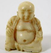 An early 20thC. ivory Buddha