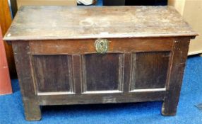 An 18thC. oak coffer with candle box, approx. 40in W x 23in H x 18.5in D