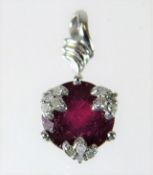 A 9ct white gold ruby pendant with diamonds 1.4g