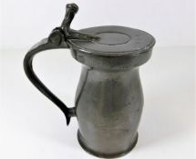 An 18thC. pewter tankard 6.25in tall