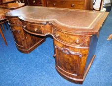 A serpentine style fronted desk with burr walnut &