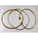 Two 10ct gold bangles & one 9ct 17.9g