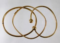 Two 10ct gold bangles & one 9ct 17.9g