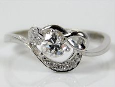 An 18ct ring with heart shaped diamond of approx.