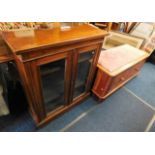 A Victorian mahogany bookcase twinned with drawer