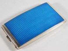 A Cartier style silver cigarette case with guilloc