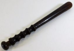 An early 20thC. walnut police baton 15in long