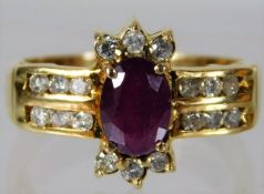 A 9ct gold ruby & diamond ring 4.2g size M