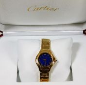 An 18ct gold ladies Cartier wristwatch with striki