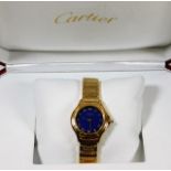 An 18ct gold ladies Cartier wristwatch with striki