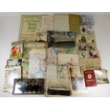 A selection of postcards, war time maps, wrestling