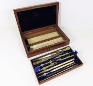A 19thC. Elliott draughtsman's set with ivory rule