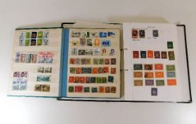 A German stamp album twinned with an album includi