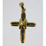 A 9ct gold cross set with blue diamonds 1g