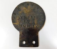 A metal Votes For Women car badge 5.5in tall x 4.2